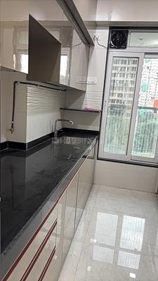 Kitchen Image of 850 Sq.ft 2 BHK Apartment / Flat for sale in Triumph Swastik, Malad West Mumbai for Rs. 23600000