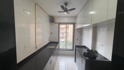 Kitchen Image of 750 Sq.ft 2 BHK Apartment / Flat for rent in Karmvir Sky Villa, Malad East Mumbai for Rs. 60000