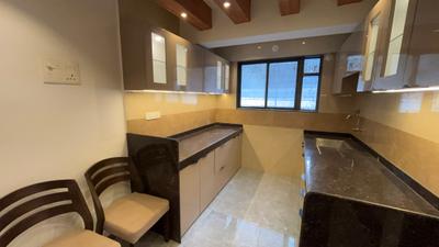 Kitchen Image of 859 Sq.ft 2 BHK Apartment / Flat for sale in Samarth Om Residency, Kothrud Pune for Rs. 9900000