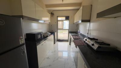 Kitchen Image of 1350 Sq.ft 3 BHK Apartment / Flat for rent in Raheja Ridgewood, Goregaon East Mumbai for Rs. 130000