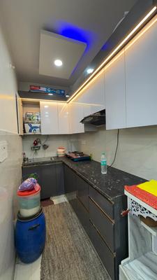 Kitchen Image of 650 Sq.ft 2 BHK Builder Floor for rent in Dwarka Mor New Delhi for Rs. 23500