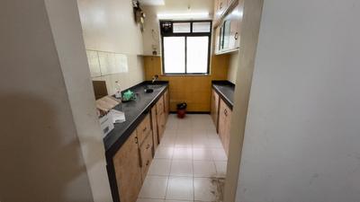 Kitchen Image of 585 Sq.ft 1 BHK Apartment / Flat for sale in Vasant Galaxy Uranus, Goregaon West Mumbai for Rs. 15500000