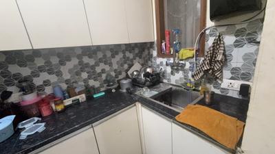 Kitchen Image of 700 Sq.ft 1 BHK Builder Floor for rent in Sector 57 Gurgaon for Rs. 18000