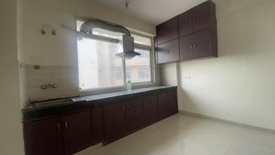Kitchen Image of 900 Sq.ft 2 BHK Apartment / Flat for sale in Signature Global Grand IVA, Sector 103 Gurgaon for Rs. 6300000