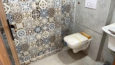 Bathroom Image of 450 Sq.ft 1 BHK Apartment / Flat for sale in Saarthi Affordable Homes, Bindapur New Delhi for Rs. 2351000