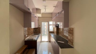 Kitchen Image of 1185 Sq.ft 3 BHK Apartment / Flat for sale in NBCC Tropical Garden, Noida Extension Greater Noida for Rs. 8635000