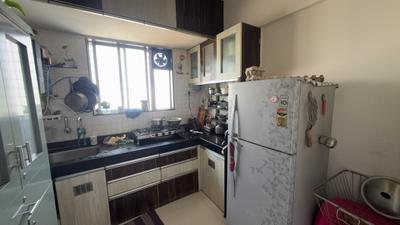 Kitchen Image of 850 Sq.ft 2 BHK Apartment / Flat for rent in Shiv Divine Dew, Rahatani Pune for Rs. 25000