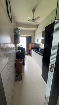 Kitchen Image of 720 Sq.ft 2 BHK Apartment / Flat for sale in Westin Karmayog, Andheri West Mumbai for Rs. 23000000