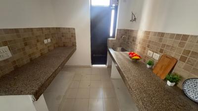 Kitchen Image of 1235 Sq.ft 2 BHK Apartment / Flat for sale in Cosmos Golden Heights, Crossings Republik Ghaziabad for Rs. 7850000