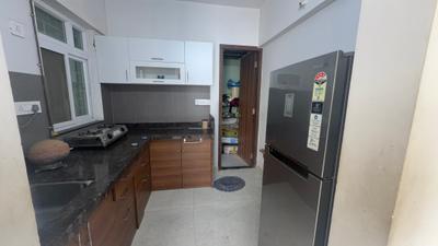 Kitchen Image of 920 Sq.ft 2 BHK Apartment / Flat for rent in Chandrarang Basileo, Pimple Gurav Pune for Rs. 35000