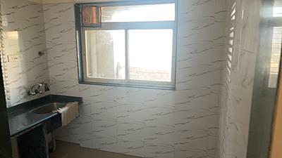 Kitchen Image of 660 Sq.ft 1 BHK Apartment / Flat for sale in Mohan Willows I, Badlapur East Badlapur for Rs. 2750000