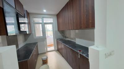 Kitchen Image of 1551 Sq.ft 3 BHK Apartment / Flat for rent in Phase 2 Noida for Rs. 32000
