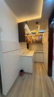 Kitchen Image of 550 Sq.ft 2 BHK Builder Floor for sale in Hastsal New Delhi for Rs. 2950000