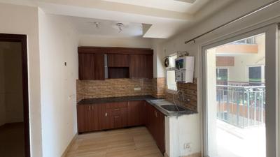 Kitchen Image of 990 Sq.ft 2.5 BHK Apartment / Flat for sale in NBCC Tropical Garden, Noida Extension Greater Noida for Rs. 7521000