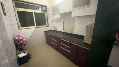 Kitchen Image of 660 Sq.ft 1 BHK Apartment / Flat for rent in Mohan Willows, Badlapur East Badlapur for Rs. 8500