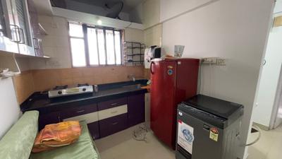Kitchen Image of 610 Sq.ft 1 BHK Apartment / Flat for sale in Magarpatta Heliconia, Hadapsar Pune for Rs. 7500000