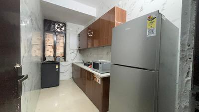Kitchen Image of 1200 Sq.ft 1 BHK Builder Floor for rent in DLF Phase 1 Gurgaon for Rs. 38000