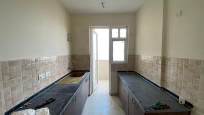Kitchen Image of 1050 Sq.ft 2 BHK Apartment / Flat for sale in Amrapali Heartbeat City II, Sector 107 Noida for Rs. 12547500