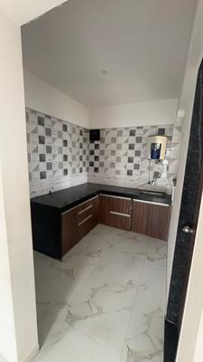 Kitchen Image of 860 Sq.ft 2 BHK Apartment / Flat for rent in Choice Goodwill Meadows Phase 1, Lohegaon Pune for Rs. 20000