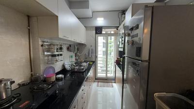 Kitchen Image of 648 Sq.ft 1 BHK Apartment / Flat for sale in RDC Pinewood, Kasarvadavali Thane for Rs. 7800000