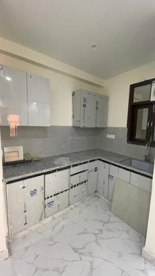 Kitchen Image of 670 Sq.ft 2 BHK Apartment / Flat for sale in ATFL JVTS Gardens, Chhattarpur New Delhi for Rs. 3500000