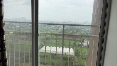 Balcony Image of 600 Sq.ft 2 BHK Apartment / Flat for rent in Kolte Patil Life Republic Sector R16 16th Avenue Arezo M Building, Marunji Pune for Rs. 25000