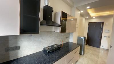 Kitchen Image of 600 Sq.ft 1 BHK Builder Floor for rent in Sector 52 Gurgaon for Rs. 37000