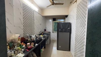 Kitchen Image of 935 Sq.ft 2 BHK Apartment / Flat for rent in Mohan Highlands, Badlapur East Badlapur for Rs. 14000