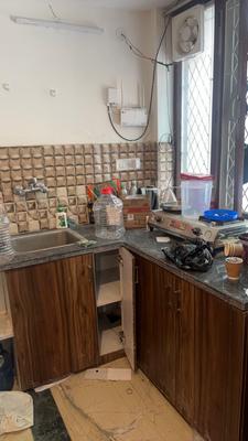 Kitchen Image of 300 Sq.ft 1 RK Builder Floor for rent in Gautam Nagar New Delhi for Rs. 25000