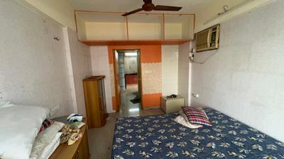 Bedroom Image of 550 Sq.ft 1 BHK Apartment / Flat for sale in Suyash Tower, Kopar Khairane Navi Mumbai for Rs. 10000001