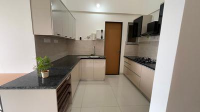 Kitchen Image of 810 Sq.ft 2 BHK Duplex for rent in Gera World Of Joy, Upper Kharadi Pune for Rs. 40000