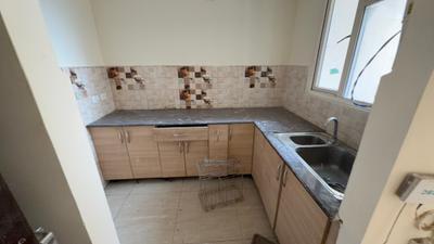 Kitchen Image of 1075 Sq.ft 2 BHK Apartment / Flat for rent in Gaur City 7th Avenue, Noida Extension Greater Noida for Rs. 21000