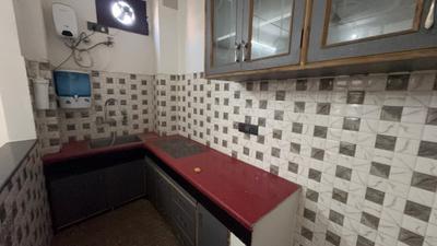 Kitchen Image of 700 Sq.ft 1 BHK Builder Floor for rent in Sector 57 Gurgaon for Rs. 25000