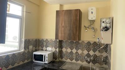 Kitchen Image of 845 Sq.ft 2 BHK Builder Floor for rent in Signature Global Park 2 And 3, Sector 36 Sohna for Rs. 25000
