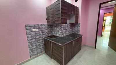 Kitchen Image of 500 Sq.ft 2 BHK Apartment / Flat for sale in Sector 4 Rohini New Delhi for Rs. 2800000