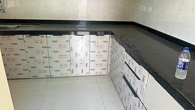 Kitchen Image of 1150 Sq.ft 2 BHK Apartment / Flat for rent in Tridhaatu Morya, Chembur Mumbai for Rs. 75000