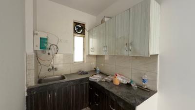 Kitchen Image of 995 Sq.ft 2 BHK Apartment / Flat for sale in Ajnara Homes, Noida Extension Greater Noida for Rs. 8800000