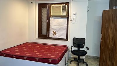 Bedroom Image of 250 Sq.ft 1 RK Builder Floor for rent in Gautam Nagar New Delhi for Rs. 25000