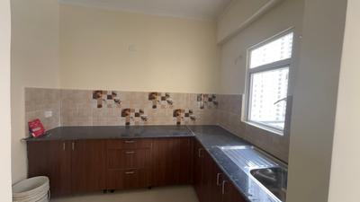 Kitchen Image of 1220 Sq.ft 3 BHK Apartment / Flat for sale in Amrapali Verona Heights, Noida Extension Greater Noida for Rs. 8945000