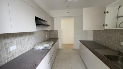 Kitchen Image of 1050 Sq.ft 2 BHK Apartment / Flat for rent in Godrej Woods, Sector 43 Noida for Rs. 52000