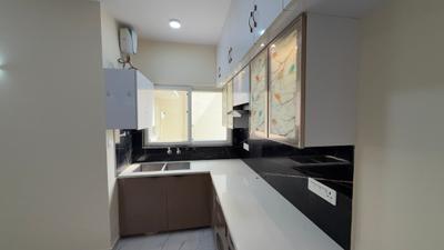 Kitchen Image of 500 Sq.ft 2 BHK Apartment / Flat for rent in Pivotal Riddhi Siddhi, Sector 99 Gurgaon for Rs. 22000