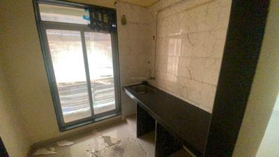 Kitchen Image of 490 Sq.ft 1 BHK Apartment / Flat for sale in Spring Wood, Taloja Navi Mumbai for Rs. 2900000
