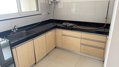 Kitchen Image of 660 Sq.ft 1 BHK Apartment / Flat for rent in Godrej Infinity, Mundhwa Pune for Rs. 27000