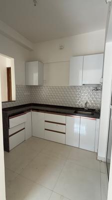 Kitchen Image of 950 Sq.ft 2 BHK Apartment / Flat for rent in Manjari Khurd Pune for Rs. 23000
