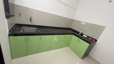 Kitchen Image of 820 Sq.ft 2 BHK Apartment / Flat for rent in Nivasa Enchante Phase 1 &amp; 2, Lohegaon Pune for Rs. 24000