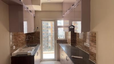 Kitchen Image of 1185 Sq.ft 3 BHK Apartment / Flat for sale in NBCC Tropical Garden, Noida Extension Greater Noida for Rs. 8600000