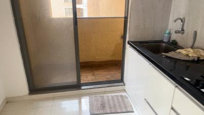 Kitchen Image of 790 Sq.ft 2 BHK Apartment / Flat for rent in Manhattan, Charholi Budruk Pune for Rs. 25000