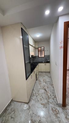 Kitchen Image of 720 Sq.ft 2 BHK Apartment / Flat for sale in Chhattarpur New Delhi for Rs. 6500000