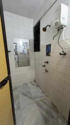 Bathroom Image of 800 Sq.ft 1 BHK Apartment / Flat for rent in Kalash Udhyan Complex, Kopar Khairane Navi Mumbai for Rs. 25000