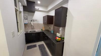 Kitchen Image of 850 Sq.ft 2 BHK Apartment / Flat for sale in Supertech Livingston, Crossings Republik Ghaziabad for Rs. 7200000